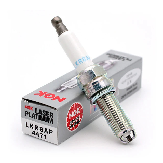 NGK spark plug for BMW M3 E90, E92, E93 S65 V8 major service kit by Nineteen72 Performance, close-up of the ignition component.