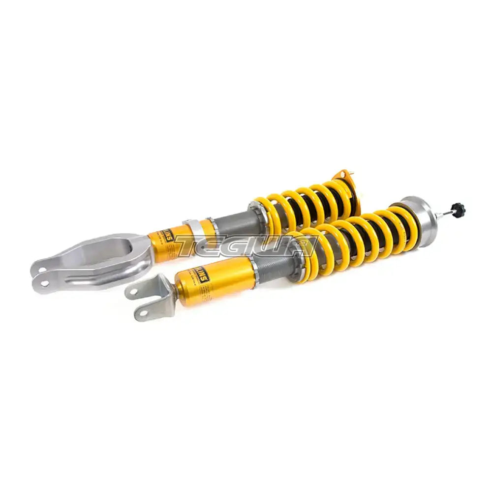 Ohlins Road & Track DFV Coilovers installed on a Nissan GT-R R35, showcasing adjustable suspension components.